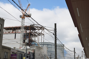 Naklejka premium looking west on Dundas St W to construction of Dani Reiss Modern and Contemporary Gallery at McCaul St, Art Gallery of Ontario, Toronto