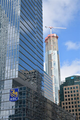 Naklejka premium looking east on Queens Quay W to RBC WaterPark Place, Waterpark Place, and SkyTower Pinnacle One Yonge St, Toronto