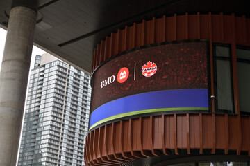 Naklejka premium digital billboard with BMO and Soccer Canada logos at The Well, 486 Front St W, Toronto