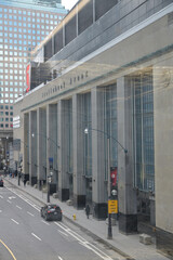 Naklejka premium through-glass-window view of exterior facade and sign of Scotiabank Arena, 40 Bay St, Toronto