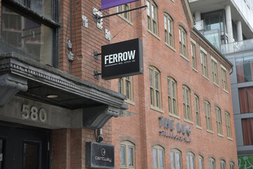 Naklejka premium wall mounted projecting sign of Ferrow (real estate) and The Keg (560 King St W), Toronto