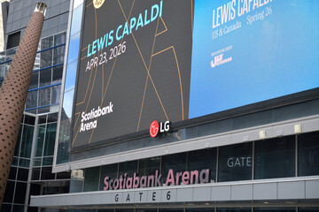 Naklejka premium LG super digital billboard outside Scotiabank Arena with Lewis Capaldi concert promotion, Toronto