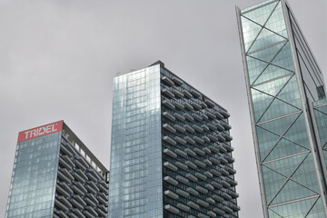 Naklejka premium skyward view of three towers in The Well residential, commercial, and business complex, 486 Front St W and 8 Spadina Av, Toronto