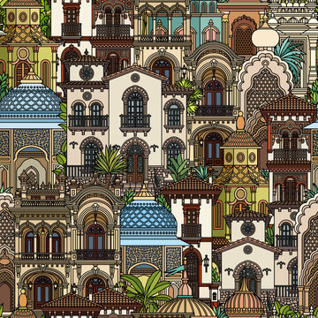 Colorful vector seamless pattern of an oriental city with domes, towers, and minarets. Perfect for Arabian, Islamic, and fairytale themed designs