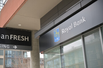 Naklejka premium signs of Sobeys Urban Fresh Spadina and RBC Royal Bank branch at 6 Fort York Blvd inside (Neo Condos), Toronto