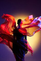 Obraz premium Artistic silhouette of a woman surrounded by flying red silk fabric on a vibrant yellow and purple background, dramatic studio lighting, flowing textile movement, conceptual fashion