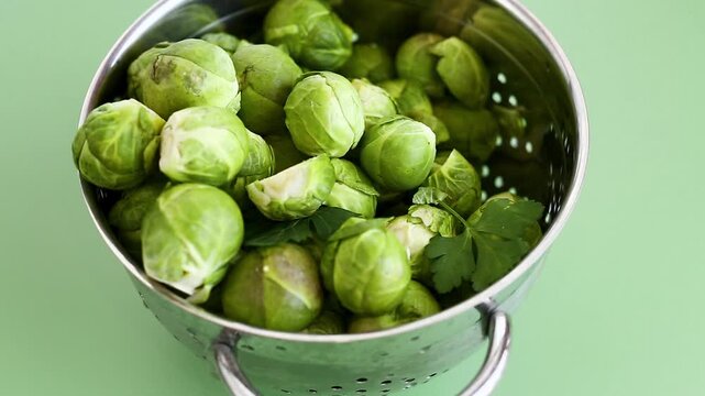green Brussels sprouts in a colander