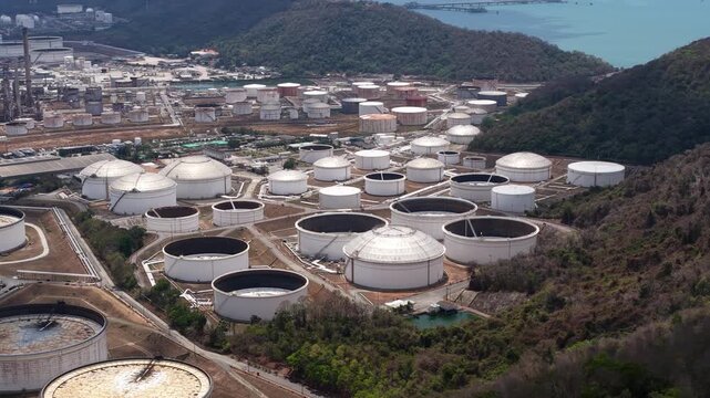 Industrial oil refinery and storage tanks aerial view