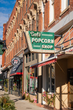 The neon sign at The Original Del&rsquo;s Popcorn Shop in historic downtown Decatur, Illinois, December 2025