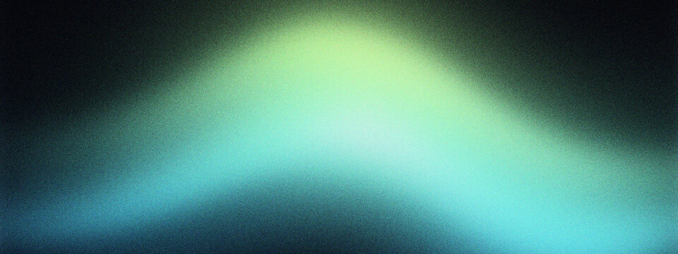 Abstract dark background with vibrant green and blue light leak effect, creating a soft gradient and atmospheric blur for modern design projects