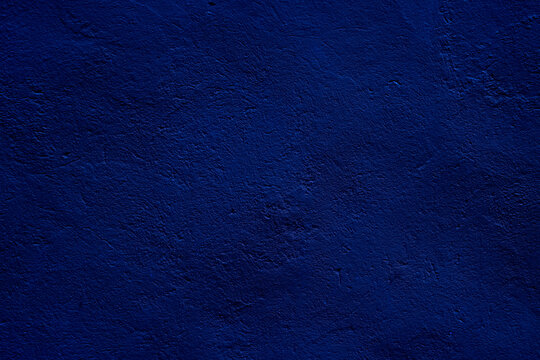 Vibrant Deep Blue Textured Wall Background for Design and Decoration