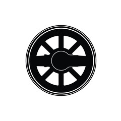 Obraz premium Black and white silhouette of a wheel with spokes and a central hub