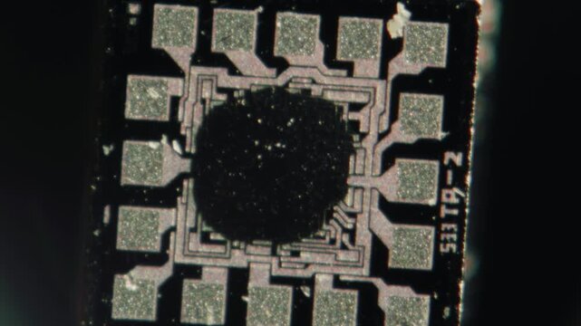 Macro Close-up Shot of Microchip, CPU Processor on Printed Circuit Board, Computer Motherboard with Components Inside of Electronic Device, Part of Supercomputer microscop.