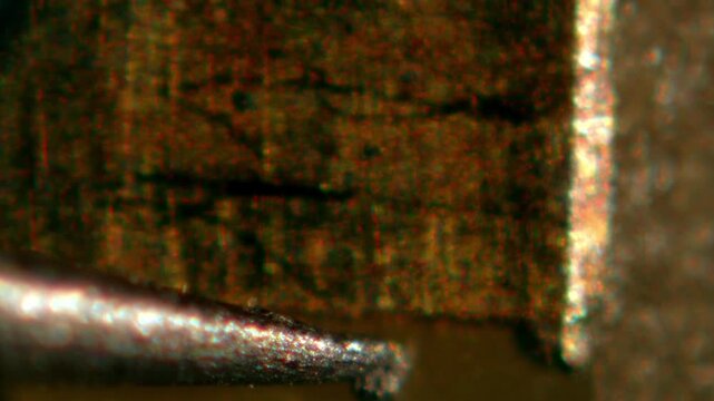 Macro Close-up Shot of Microchip, CPU Processor on Printed Circuit Board, Computer Motherboard with Components Inside of Electronic Device, Part of Supercomputer microscop.