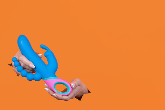 A sex toy. Triple telescopic vibrator with clitoral stimulation and anal stimulation. A sex shop