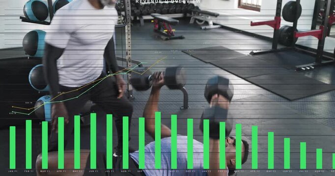 Coach cue starting trainee pressing DBs while coach spotting for safety and analytics bar growing