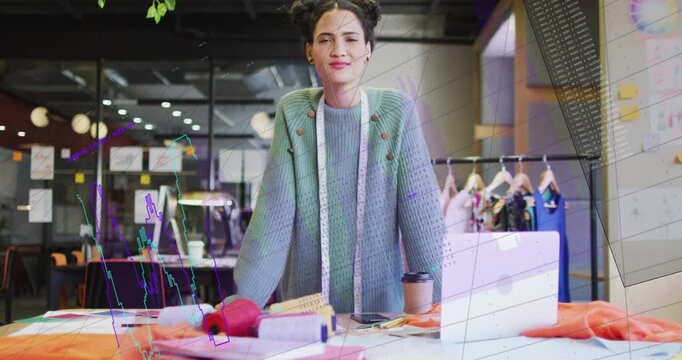 Camera rising, woman fashion designer leaning on table, reviewing fabrics and tape, preparing line