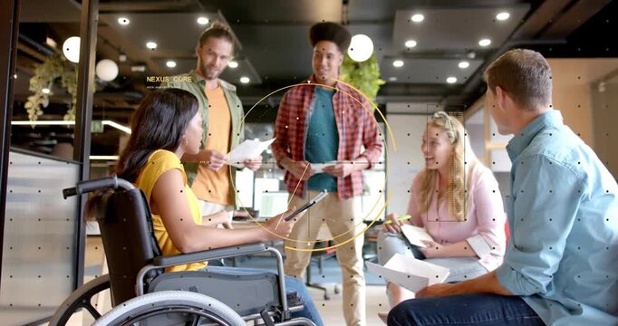 Woman in wheelchair tapping tablet, opening HUD circle highlighting data, business team planning
