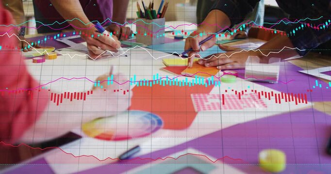 Designers hands arranging paper and markers, animated data bars appearing, guiding design decisions