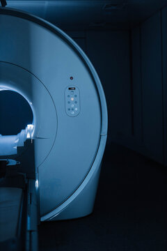 Medical CT or MRI Scan in the modern hospital laboratory. Interior of radiography department. Technologically advanced equipment in white room. Magnetic resonance diagnostics machine. Advertising