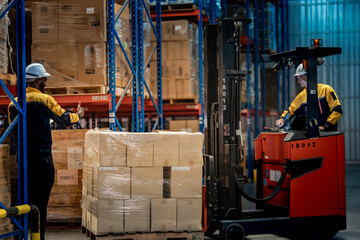 frican American warehouse worker raising hand to guide Caucasian forklift driver. Professional industrial team communicating for safe cargo pallet transport in distribution center. © ultramansk