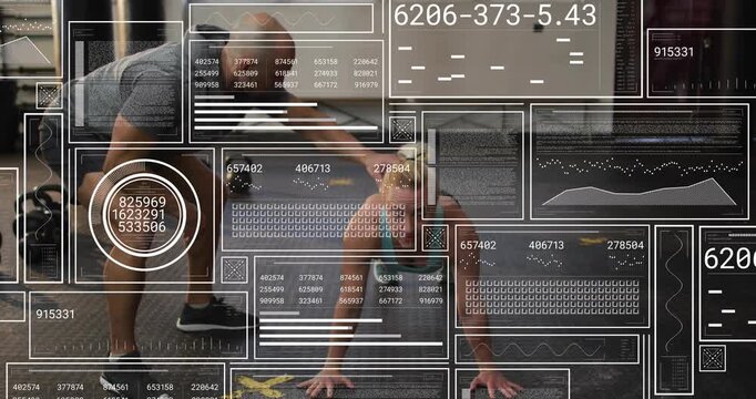 Male trainer guiding female trainee in shorts performing pushups on gym floor with kettlebells, HUD