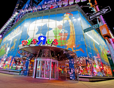 New York City, USA; 28th December 2011: The iconic Toys "R" Us flagship store in Times Square famous for its 60-foot indoor Ferris wheel, a 20-foot animatronic T-Rex, and a life-size Barbie dollhouse.
