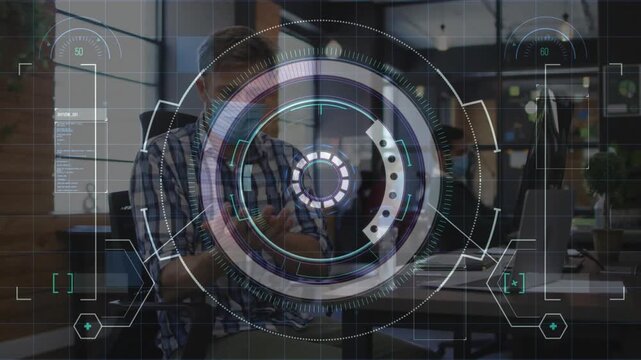 Businessman sanitizing at desk with frames progressing, circular HUD expanding, centering over desk