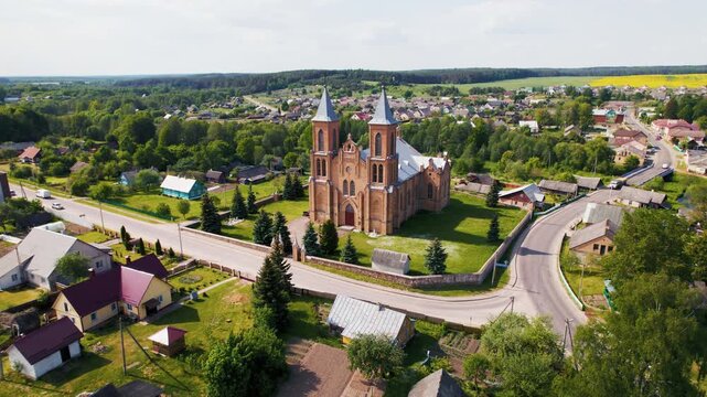 Aerial view of a catholic church in a small european village
