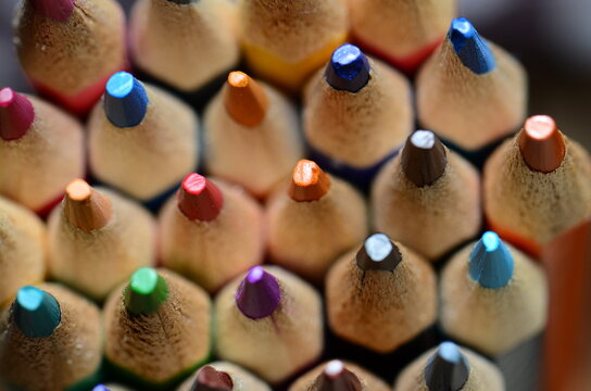 A macro artistic shot for color pencils tips with selective focus points.