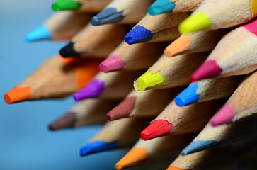 A macro artistic shot for color pencils tips with selective focus points.