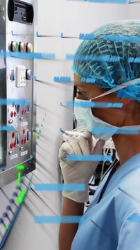 Vertical video: Nurse touching mask leaning checking panel overlay rising over hand ensuring care