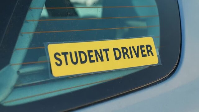 Student driver sticker on a car.