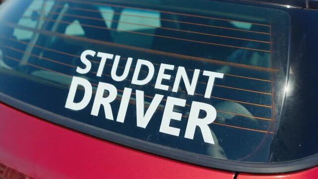 Student driver sticker on a car.