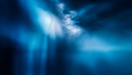 Obraz premium A captivating ethereal landscape with soft blue hues and dramatic clouds creating a mystical atmosphere.
