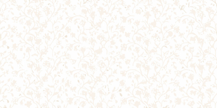 Delicate floral pattern on a light blush and cream background