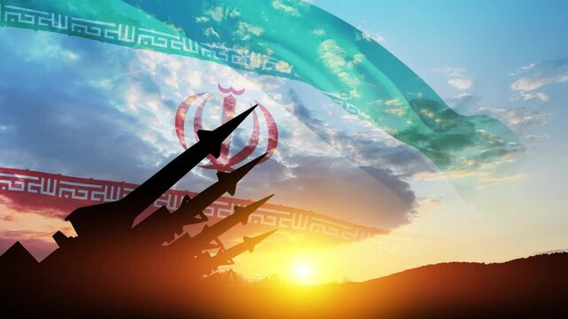 The missiles are aimed at the sky at sunset with Iran flag. Bomb, chemical weapons, missile defense, a system of salvo fire.