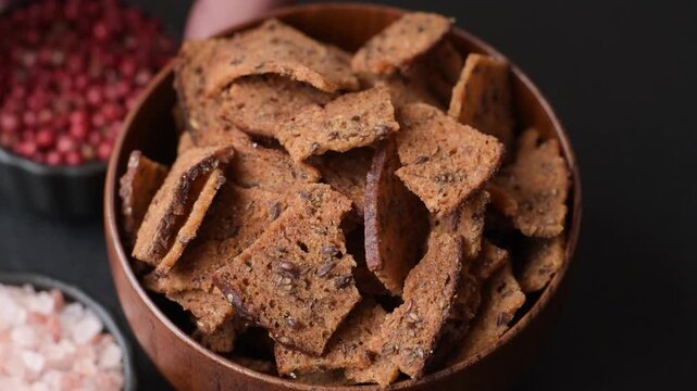 Croutons or crackers made from rye bread with garlic, salt, and spices, a salad ingredient. Croutons with salt and garlic as a food background for your design
