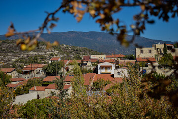 Obraz premium Scenic View of Lofou Village with Traditional Stone Houses in Cyprus