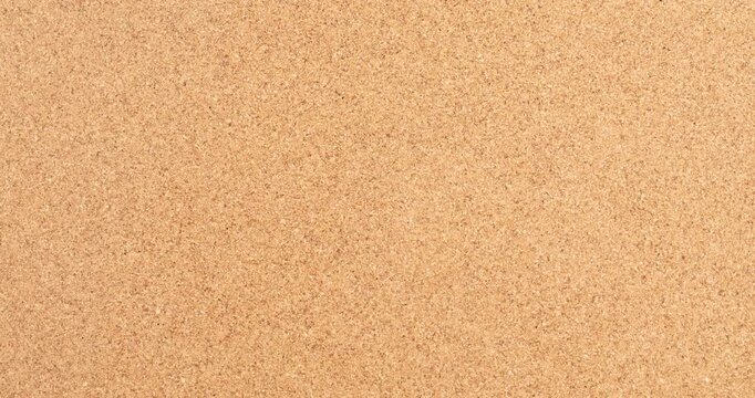 Panoramic video of a yellow brown cork board texture