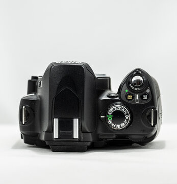 Gothenburg, Sweden - november 29 2025: top view of nikon digital camera showing mode dial and controls.