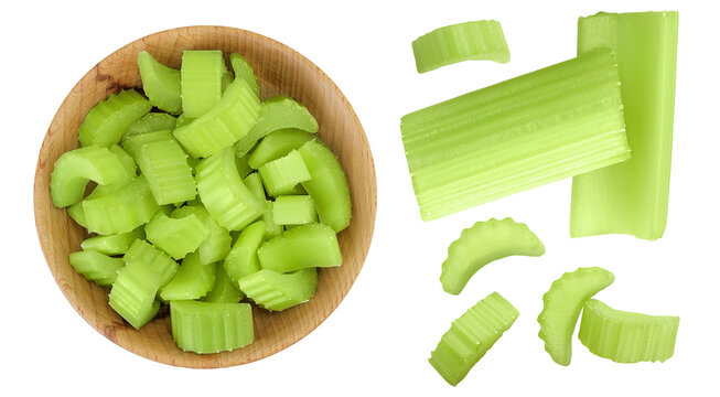 fresh celery in wooden bowl isolated on white background. Top view. Flat lay