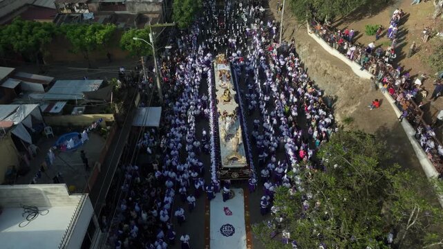 Aerial Drone View of Holy Week Procession in Guatemala City &ndash; Catholic Tradition, Purple Robes and Religious Float