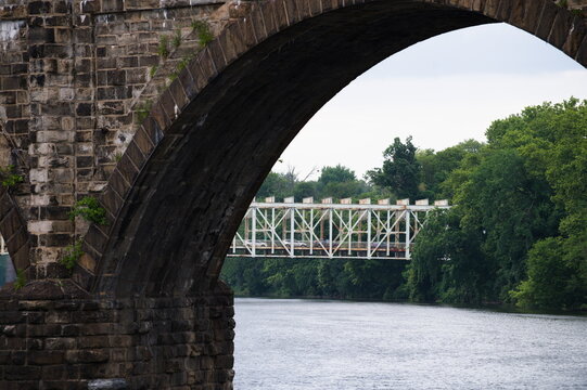 East Falls section of Philadelphia showing two bridges, foreground, the railroad bridge crossing between West Philadelphia and East Falls, and background, the Falls Bridge. 