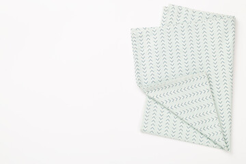 Fototapeta premium Kitchen napkin on color background, top view