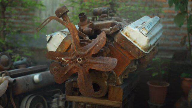 Rusty, dusty, and greasy internal combustion engine parts needing repair
