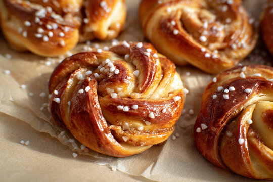 Close-up photo of freshly baked Swedish traditional cinnamon buns Kanelbullar