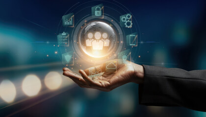 Fototapeta premium Digital Sphere of Data: A hand cradles a glowing sphere of interconnected digital icons, representing the essence of technological data, innovation, and futuristic connections.
