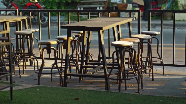 Chairs and tables stacked in a closed pub.