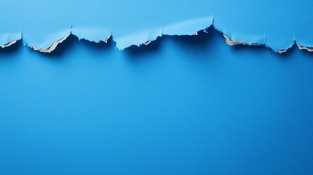 Cartoncino azzurro strappato. Spazio per testo o messaggio.